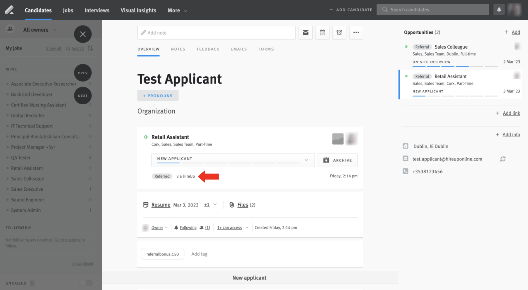 Arrow pointing to HireUp source tag on candidate opportunity profile in Lever